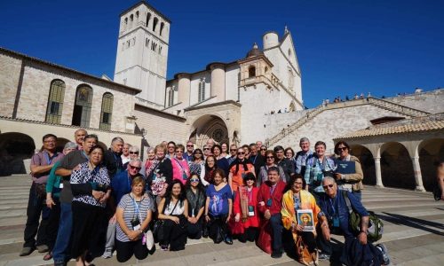 Pilgrims gathered at the Basilica of St. Francis of Assisi in Assisi, Italy