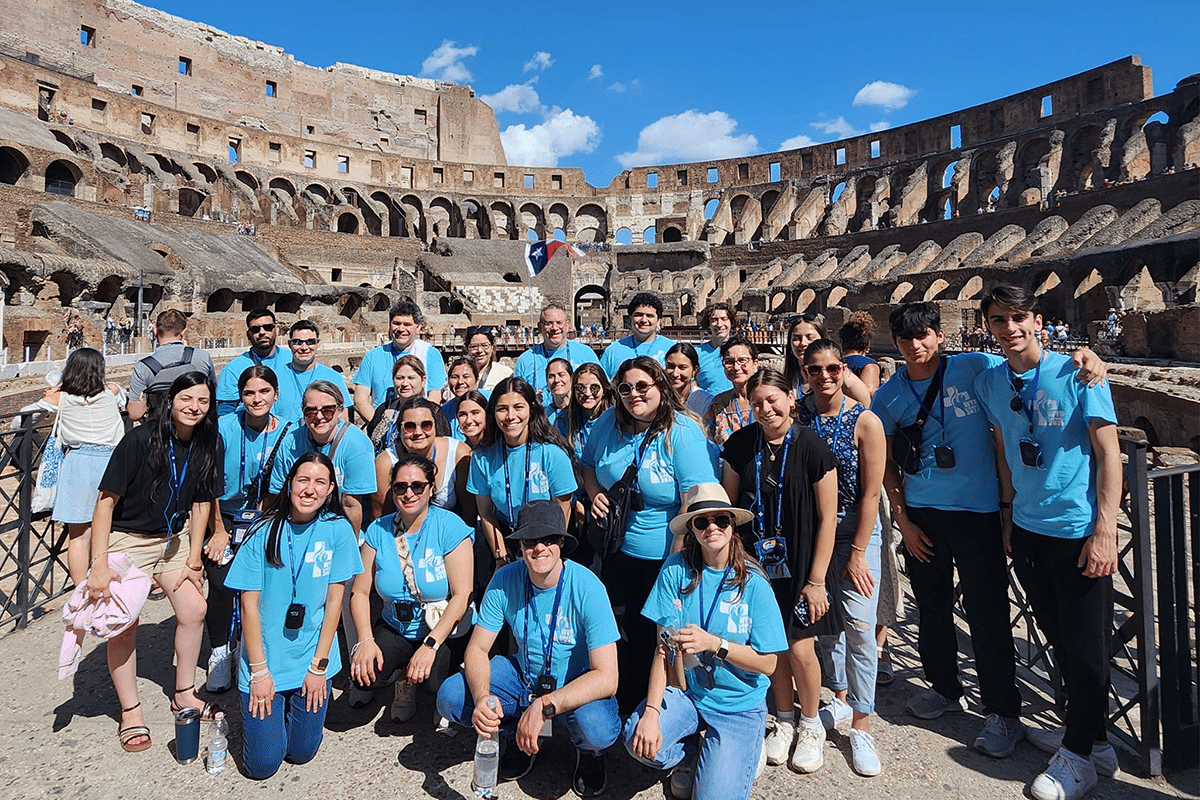 A group on pilgrimage at the Roman Colosseum