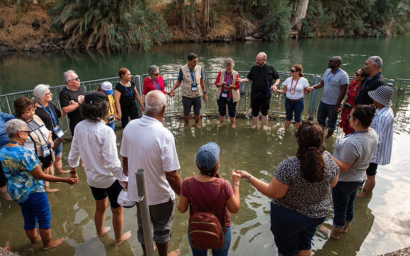 Pilgrims In The Jordan River