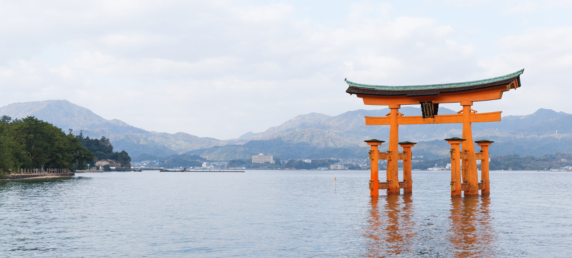 Itsukushima Shrine Torii Gate In Japan