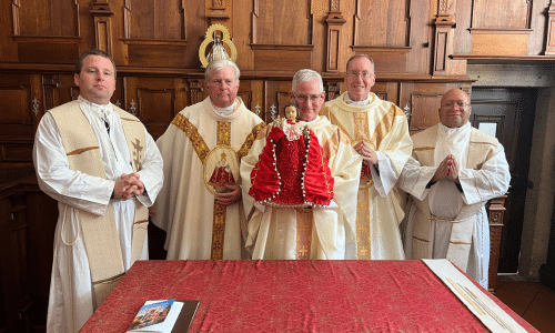 Fr. Rocky with the Infant Jesus of Prague Relevant Radio's Fr. Rocky with the Infant Jesus of Prague