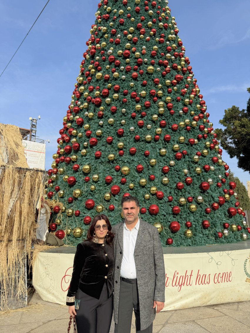 Bethlehem Tree 3 Nativity CEO Khaled Jacoub and wife Yara in front of the Christmas Tree, Manger Square in Bethlehem
