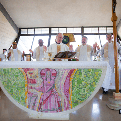Priests performing Mass at St. Peter's Church in Capernaum, Israel