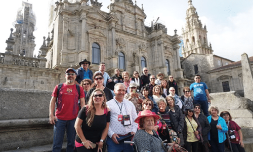 Pilgrims in front of St. James Cathedral in Santiago de Compostela, Spain