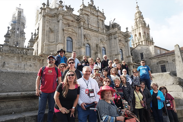 Pilgrims in front of St. James Cathedral in Santiago de Compostela, Spain
