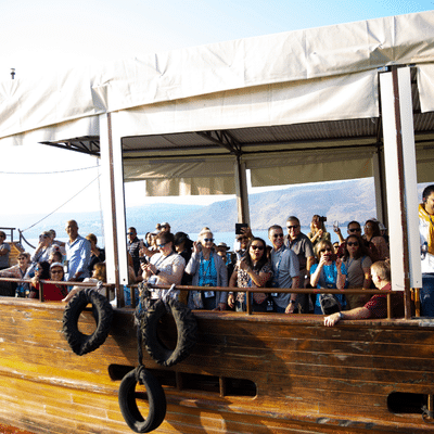 Pilgrims sailing on a boat on the Sea of Galilee in Israel